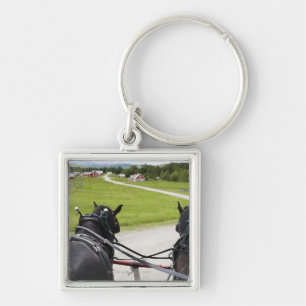 Llavero Caballos de Perchon que tiran del carro contra