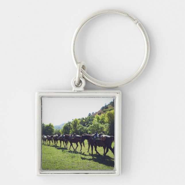 Llavero Caballos que caminan en una línea (Frente)