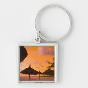 Llavero cabañas de playa de estilo Palapa al amanecer, Bel