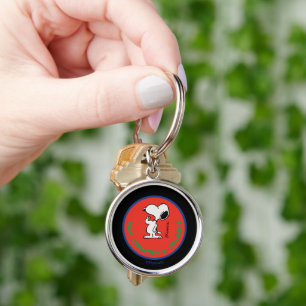 Llavero Cacahuetes   Snoopy Raw Strength & Courage Badge