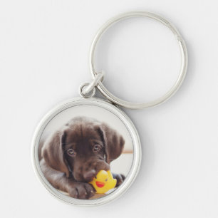 Llavero Cachorro de chocolate con pato de juguete