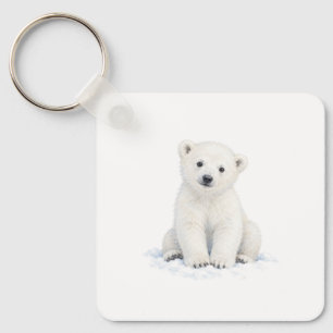 Llavero Cachorro de Oso Polar Sentado en la Nieve