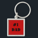 Llavero Cadena de claves de #1 papá<br><div class="desc">¡Celebremos la grandeza de tu padre con nuestra cadena de claves Metalizado cuadradas de primer nivel "#1 DAD"! Esta cadena de claves elegante y duradera está diseñada para recordarle lo especial que es cada vez que agarra sus llaves. Esta cadena de llaves, elaborada a partir de un metalizado de alta...</div>