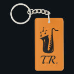 Llavero cadena de teclas de color personalizado para repro<br><div class="desc">Cadena de teclas de color personalizado para el reproductor saxofónico. Sax con notas musicales. Idea de regalo de Guay para el jugador,  el aficionado al jazz,  el músico,  el estudiante,  etc.</div>