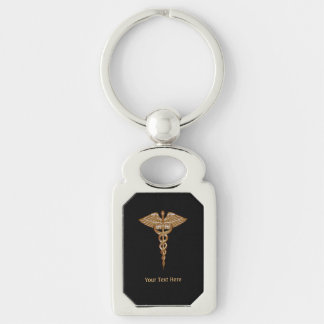 Llavero Caducto médico oro negro Metalizado