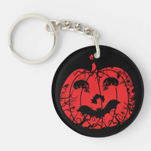 Llavero Calabaza espeluznante con calaveras y murciélagos