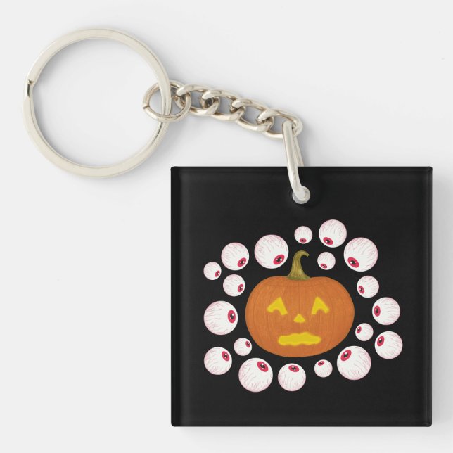 Llavero Calabaza Jack-o-Lantern y los ojos amarillos en la (Frente)