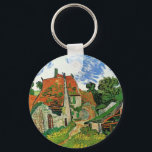 Llavero Calle del pueblo de Vincent van Gogh<br><div class="desc">Calle del pueblo de Vincent van Gogh es una pintura arquitectónica postimpresionista de arte fino vintage que presenta una hilera de cabañas en un camino rural en la ciudad de Auvers, Francia. Sobre el artista: Vincent Willem van Gogh fue un pintor postimpresionista cuya obra fue más notable por su belleza...</div>