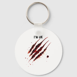 Llavero Camisa sangrienta Estoy bien, la mancha de sangre 
