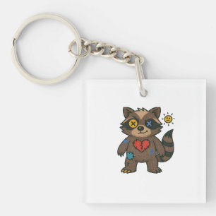 Llavero Camiseta Voodoo Raccoon — Traviuras remendadas