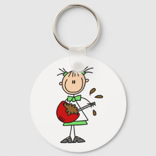 Llavero Camisetas y regalos de niña mezclando masa