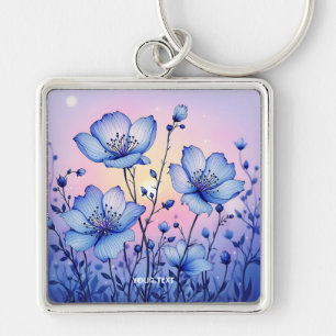 Llavero Campo de flores azules ricas de fantasía