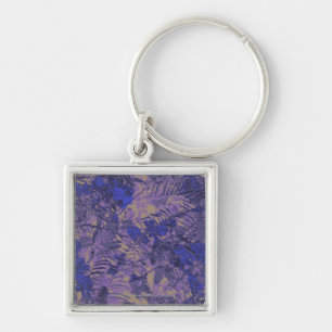 Llavero Camuflaje contra la flor azul