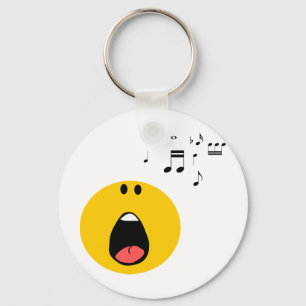 Llavero cantando su poco corazón hacia fuera