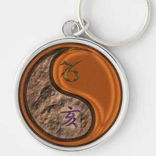 Llavero Capricornio y Wood Boar Keychain