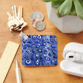 Llavero Carácter real azul malvado ocular personalista Cód