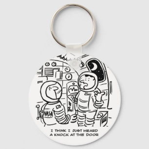 Llavero Caricatura de astronautas en una nave espacial. Ca