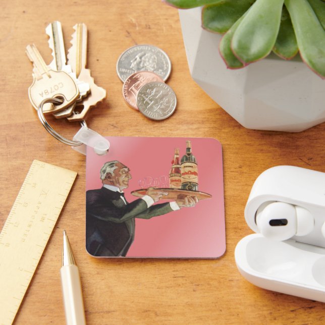 Llavero Carnicero de época en un esmoquin sirviendo vino e (Escritorio )