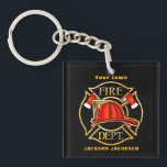 Llavero Casco de bomberos<br><div class="desc">Este diseño presenta un emblema rojo y negro sobre un fondo negro.</div>