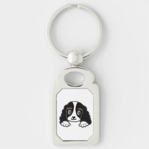 Llavero cavalier kcs peleándose en blanco y negro
