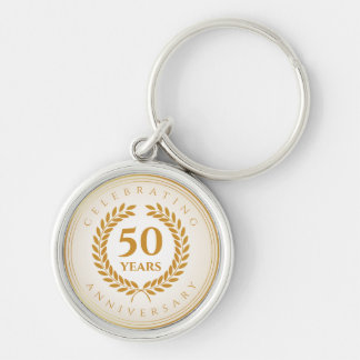 Llavero Celebrando el aniversario. Personalizado en oro