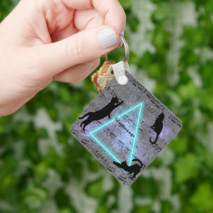 Llavero Celestiales 3 gatos negros amantes de la música