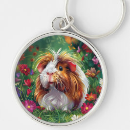 Llavero Cerdo de Guinea entre las flores