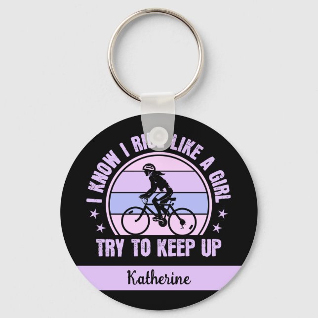 Llavero Chica de ciclismo intenta mantener la bicicleta re (Anverso)