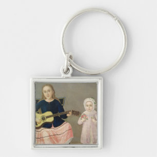 Llavero Chica joven con una guitarra y un niño con a