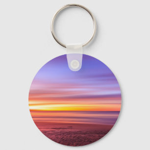 Llavero Cielo al atardecer sobre playa y mar