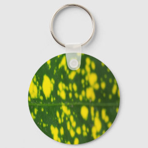 Llavero Círculo Metalizado de punto amarillo de hoja verde
