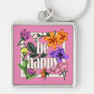 Llavero Cita positiva Be Happy y flores de jardín