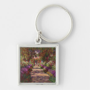 Llavero Claude Monet el un camino en el jardín de Monet