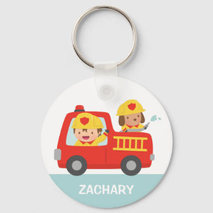 Llavero Coche de bomberos rojo con el muchacho y el