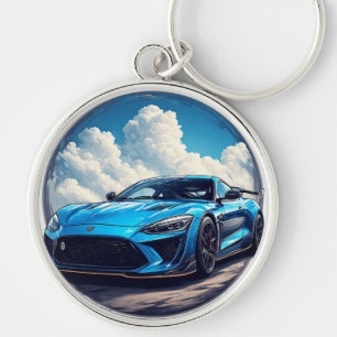 Llavero Coche deportivo azul elegante bajo un cielo nublad