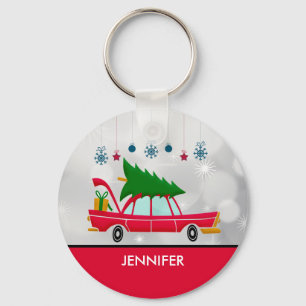 Llavero Coche rojo retro que lleva un árbol de Navidad
