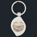 Llavero Colcha de patchwork floral Cottagecore acuarela<br><div class="desc">Una escena soñadora de cottagecore se despliega a través de suaves pinceladas de acuarela, con una colcha de patchwork de inspiración vintage rodeada de flores de jardín en flor. Suaves tonos pastel de rosa sonrojado, azul polvoriento, verde salvia y crema mantecosa crean una paleta nostálgica y tranquilizadora que se siente...</div>