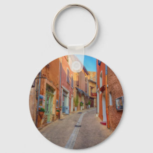 Llavero Colorida ciudad francesa en la ladera de la colina