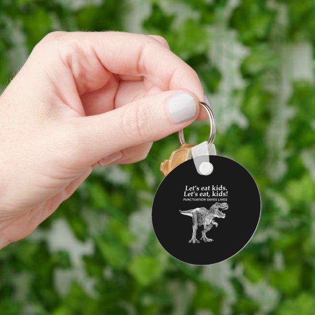 Llavero Comamos la puntuación de niños salva vidas dinosau (Mano)