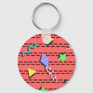 Llavero cometas, estrellas, triángulos y líneas curvas