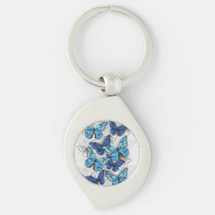Llavero Composición de las mariposas blancas y azules