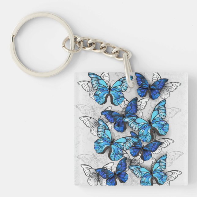 Llavero Composición de las mariposas blancas y azules (Frente)