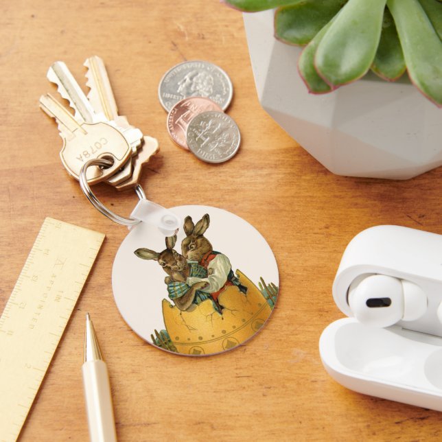 Llavero Conejitos en un huevo de oro, la vieja Pascua vict (Escritorio )