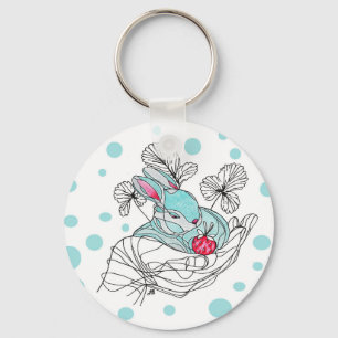 Llavero Conejo Aqua de Keychain en mano