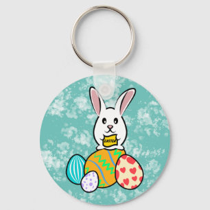 Llavero Conejo de Pascua con pancarta en huevos de Pascua