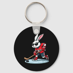 Llavero Conejo de Pascua jugando hockey 