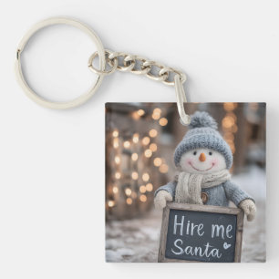 Llavero "Contraten a Santa" Snowman con un Rótulo