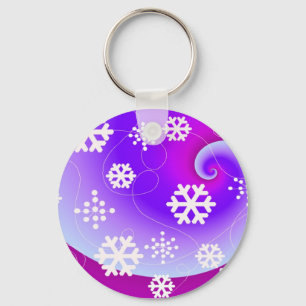 Llavero Copingos de nieve bailando sobre un fondo morado e