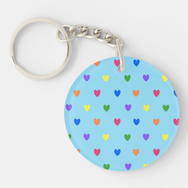 Llavero Corazones de polka arcoiris sobre azul bebé (Frente)