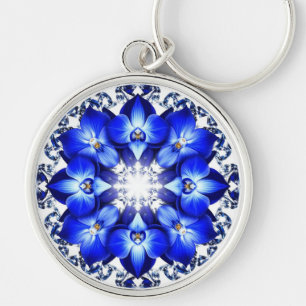 Llavero Corona elegante adornada con flores azules